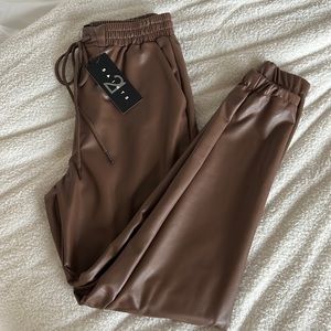 Women’s faux brown “leather” pants.